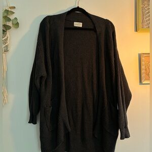 Oversized knit cardigan.
